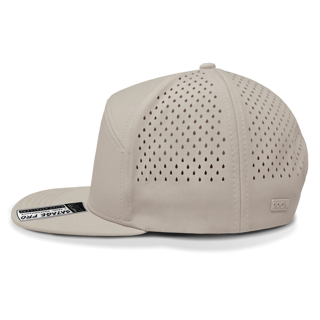 Beige baseball cap with perforated design on a white background side view